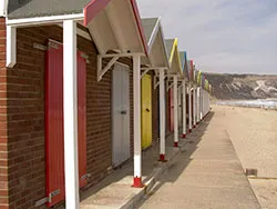 Click to view image Painted beach huts