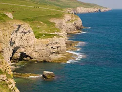 Click to view image Dancing Ledge from the west