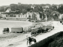 Click to view Shore Road with Bathing Huts on the beach