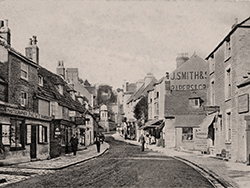 Click to view image Looking up the High Street 1904 - 1959
