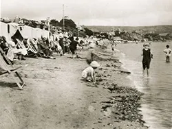Click to view image Children and Families on the Beach