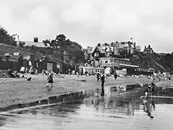 Click to view image Beach and Beach Huts in the 1930s