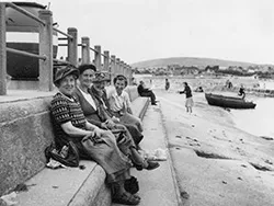 Click to view image Family sat near the Stone Quay