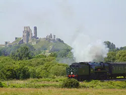 Click to view image Steam train leaving Corfe Castle