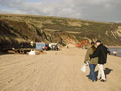 Click to view image Working on the beach at Ocean Bay