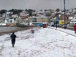 Click to view image Snow on the Beach