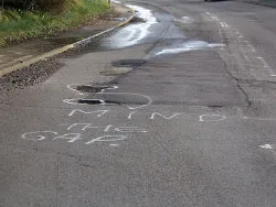 Click to view image Holes in the Roads at Ulwell