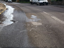 Click to view image Holes in the Roads - 1442