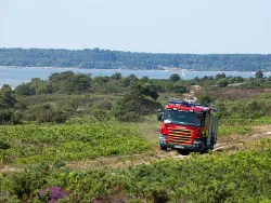 Fire engine driving across the heath - Ref: VS1451