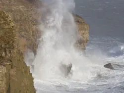 Click to view image Sea coming over the cliffs at Durlston