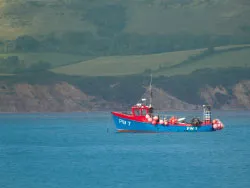 Click to view image Fishing boat in Swanage Bay