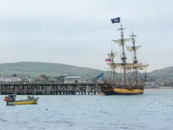 Click to view image Jolly Roger and Fishing Boat