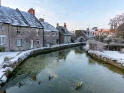 Click to view image Snow at the Millpond with ducks