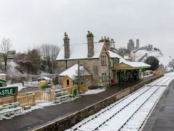 Click to view image Snow on the tracks at Corfe Station