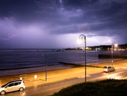 Click to view image Lightning over the bay from Sandpit Field