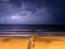 Click to view image Lightning over the bay from the Beach
