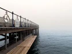 Click to view image Fog at the pier walkway