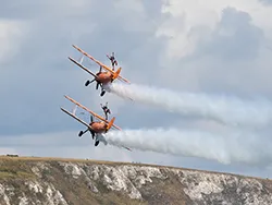 Click to view image AeroSuperBatics Wingwalkers at Swanage Carnival