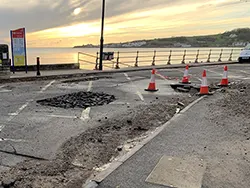 Click to view image Shore Road damage after heavy rains