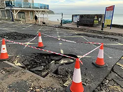 Click to view image Shore Road damage after heavy rains