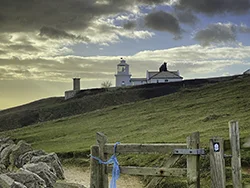 Click to view image Storm clouds over the lighthouse