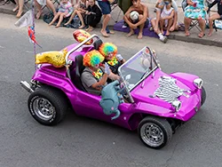 Click to view image Swanage Carnival Procession 2025 Purple Buggy