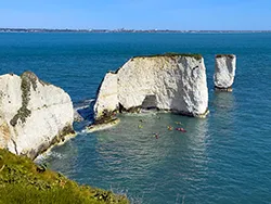 Click to view image Old Harry Rocks with Kayaks in the water