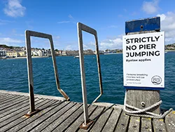 No Pier Jumping sign on the Swanage Victorian Pier - Ref: VS2610