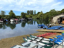Click to view image Hire boats on the edge of the River Frome