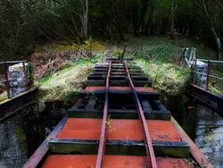 Click to view image Disused rusty tram tracks on bridge
