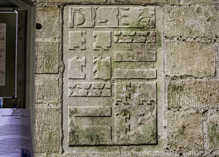 A coat of arms in stone, echoing the stars and stripes
