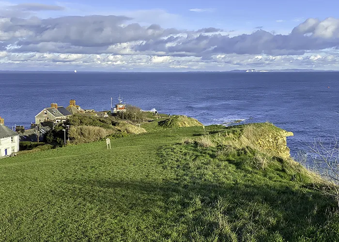 The headland at the south of Swanage Bay, with its ledges, tidal race and Coastwatch lookout