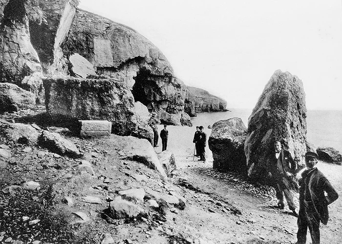 Men outside the caves